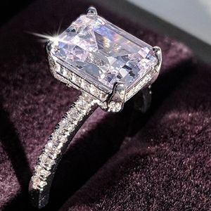 3.5 CARAT EMERALD CUT PAVE ENGAGEMENT RING